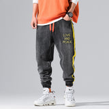 Japanese Style Fashion Men Jeans Black Elastic Waist LOVE AND PEACE Embroidery Hip Hop Pants hombre Streetwear Joggers Jeans Men